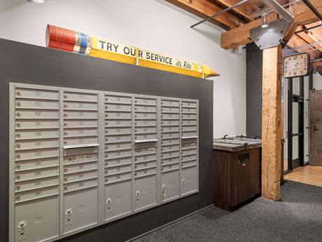 The mailroom, under the original timber ceiling