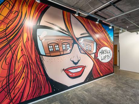 The hand-painted mural at the courtyard entrance